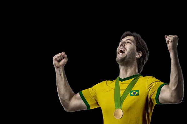 Atleta Celebrando uma medalha de ouro — Fotografia de Stock