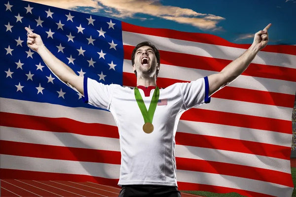 Athlete Celebrating a golden medal — Stock Photo, Image