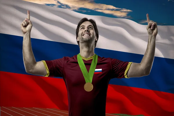 Atleta Celebrando una medalla de oro — Foto de Stock