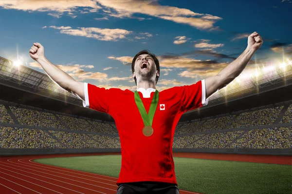 Athlete Celebrating a golden medal — Stock Photo, Image