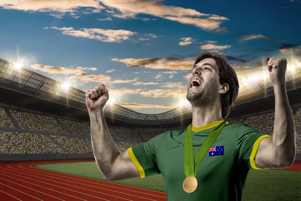 Atleta Celebrando una medalla de oro —  Fotos de Stock