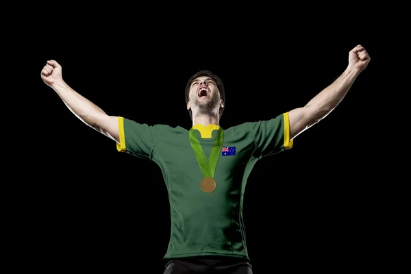 Спортсмен празднует золотую медаль — стоковое фото