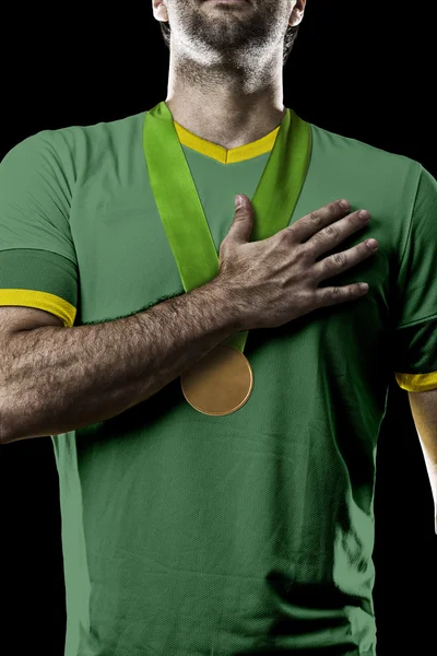 Αθλητής γιορτάζει ένα χρυσό μετάλλιο — Φωτογραφία Αρχείου