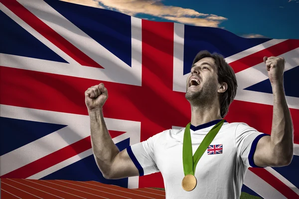 Athlete Celebrating a golden medal — Stock Photo, Image