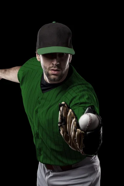 Jugador de béisbol con uniforme verde — Foto de Stock