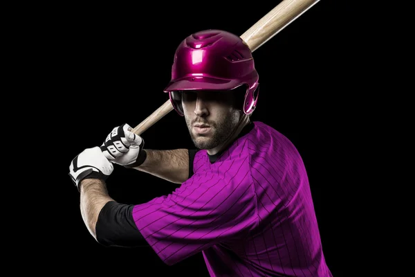 Baseballspelare med en rosa uniform — Stockfoto