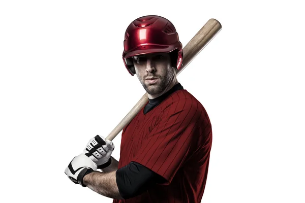 Baseballspelare med en röd uniform — Stockfoto