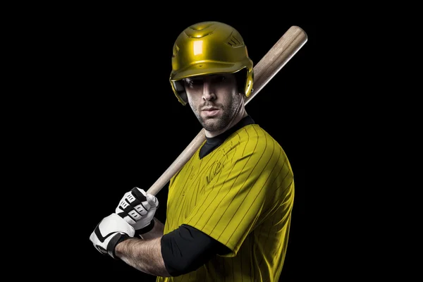 Beyzbol oyuncusu sarı üniforma ile — Stok fotoğraf