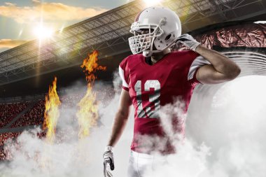 Futbolcu kırmızı üniforma ile