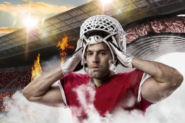 Futbolcu kırmızı üniforma ile