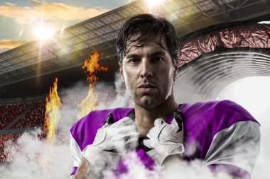 Futbolcu pembe üniforma ile