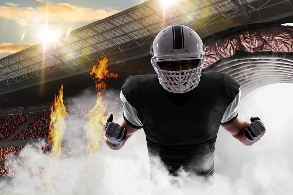 Football Player with a black uniform — Stock Photo, Image