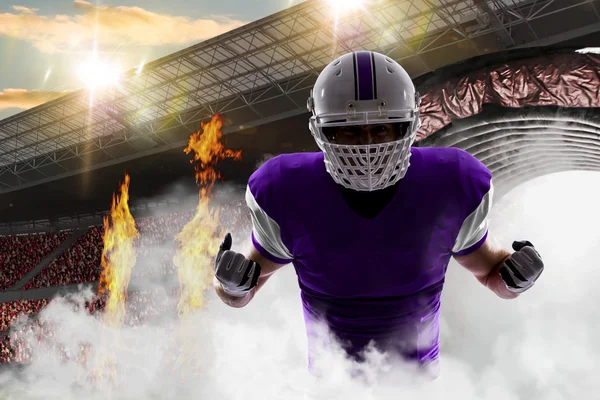 Football Player with a purple uniform — Stock Photo, Image