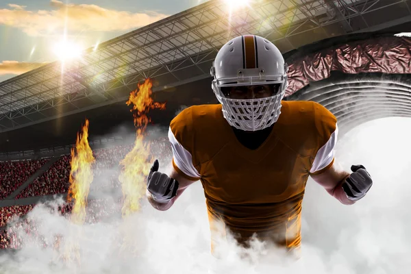 Football Player with a orange — Stock Photo, Image