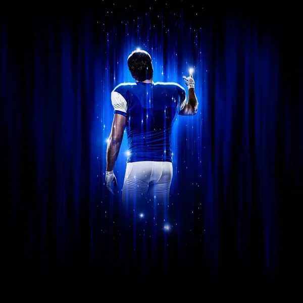 Football Player Player Superhero Pose Wearing Blue Uniform Black Background — Stock Photo, Image