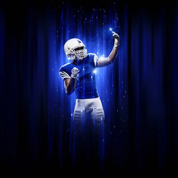 Voetbalspeler Met Een Superheld Poseren Een Blauw Uniform Een Zwarte — Stockfoto
