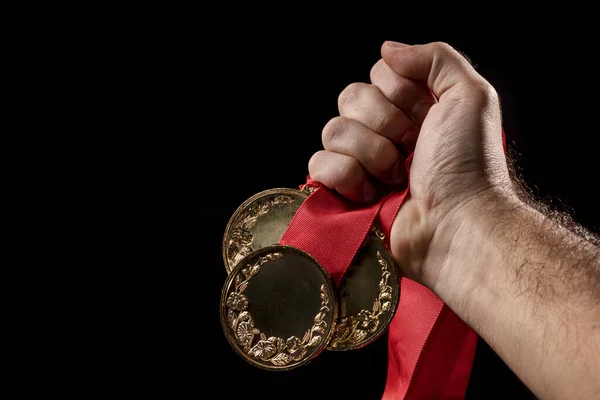 Main Tenant Une Médaille Noir Avec Visage Vide Pour Texte — Photo
