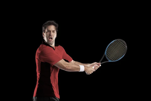 Jogador de tênis com uma camisa vermelha . — Fotografia de Stock