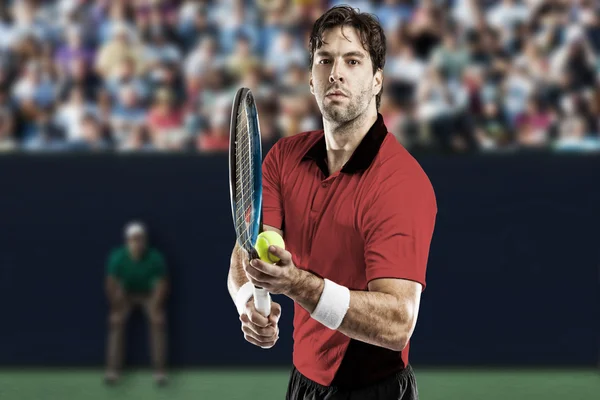 Tennis player with a red shirt. — Stock Photo, Image