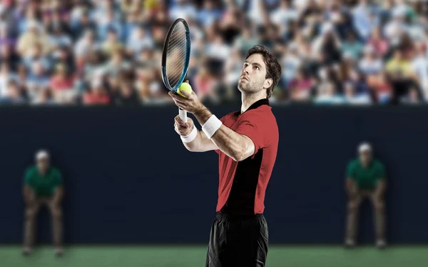 Tennis player with a red shirt. — Stock Photo, Image