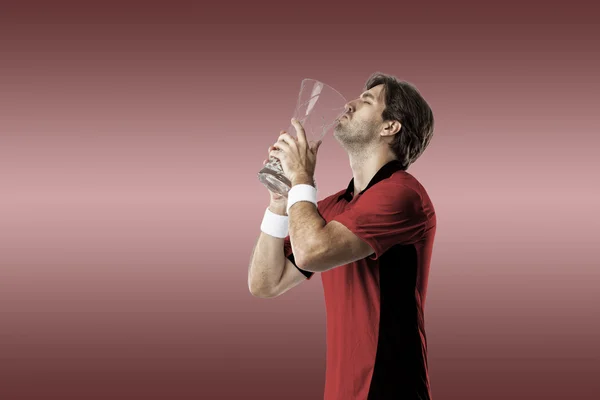 Tennis player with a red shirt. — Stock Photo, Image