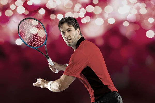 Tennisspeler met een rode shirt. — Stockfoto