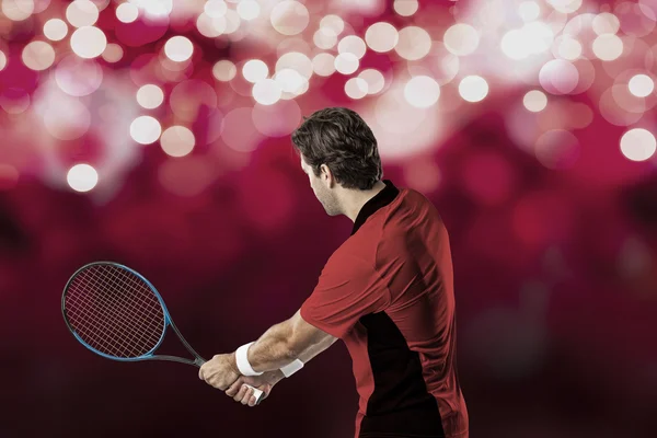 Tennis player with a red shirt. — Stock Photo, Image