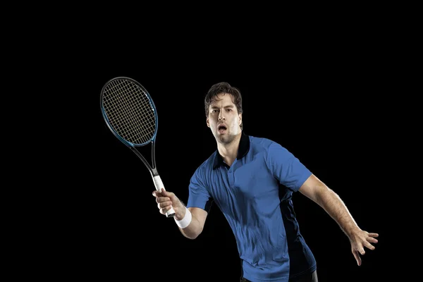 Jugador de tenis con camisa azul . — Foto de Stock