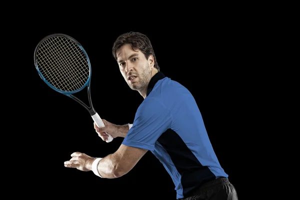 Mavi bir gömlek ile tenis oyuncusu. — Stok fotoğraf