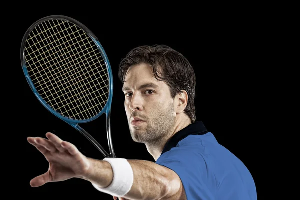 Jugador de tenis con camisa azul . — Foto de Stock