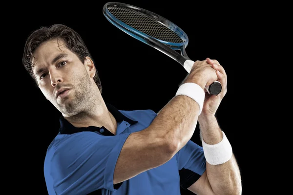 Tennis player with a blue shirt. — Stock Photo, Image