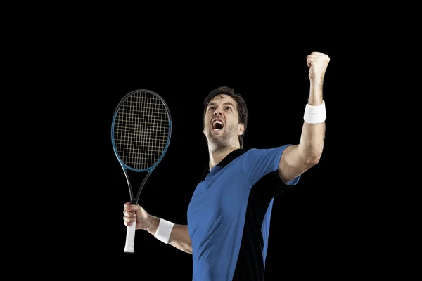 Jogador de tênis com uma camisa azul . — Fotografia de Stock