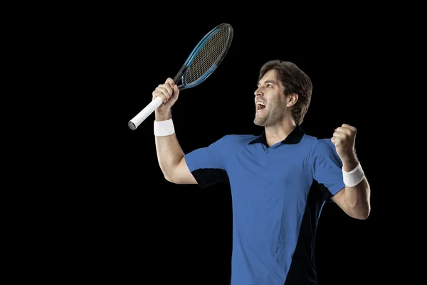 Jogador de tênis com uma camisa azul . — Fotografia de Stock