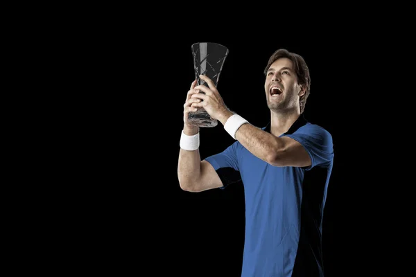 Jogador de tênis com uma camisa azul . — Fotografia de Stock