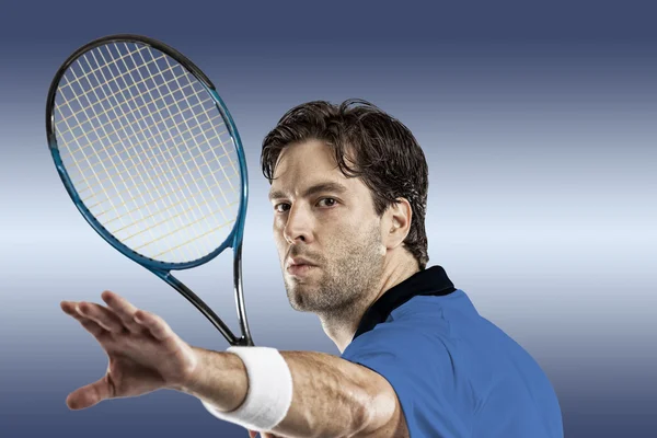 Tennis player with a blue shirt. — Stock Photo, Image