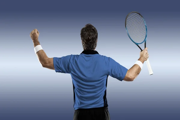 Tennisspeler met een blauw shirt. — Stockfoto