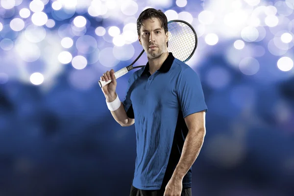 Tennisspeler met een blauw shirt. — Stockfoto