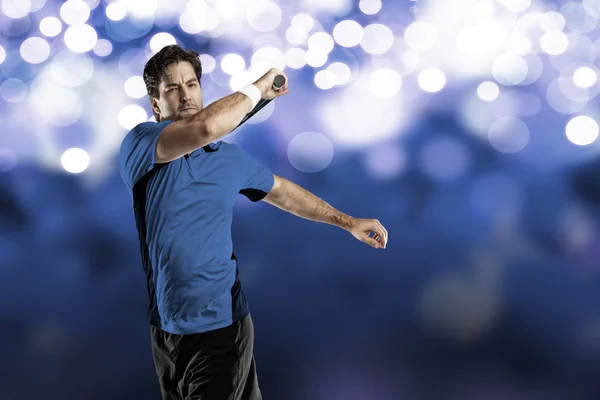 Tennis player with a blue shirt. — Stock Photo, Image