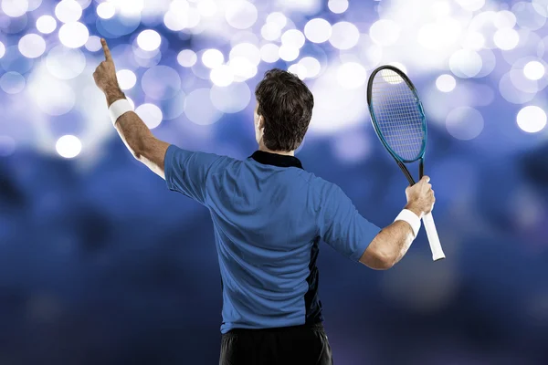 Tennisspeler met een blauw shirt. — Stockfoto