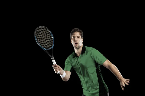 Jogador de tênis com uma camisa verde . — Fotografia de Stock