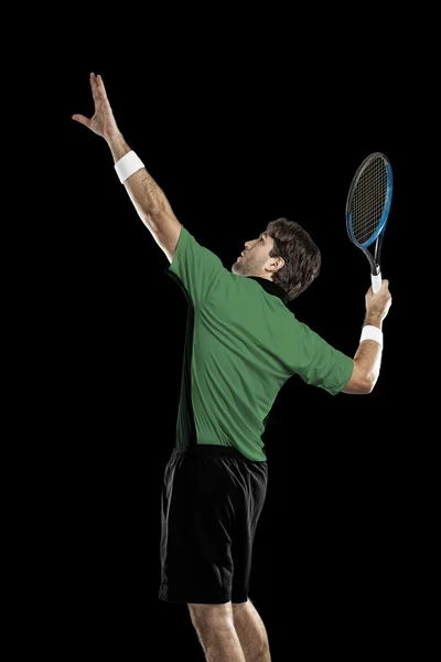 Jogador de tênis com uma camisa verde . — Fotografia de Stock