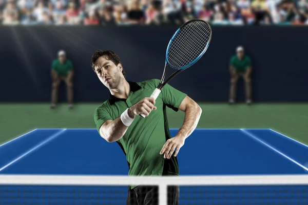 Tennisspeler met een groen shirt. — Stockfoto