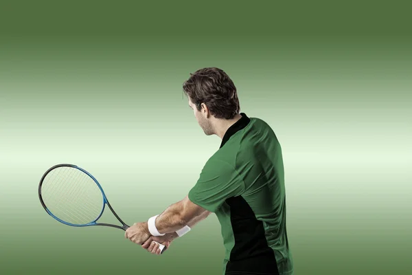 Tennisspeler met een groen shirt. — Stockfoto