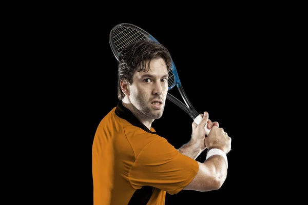 Tennisspelare med en orange skjorta. — Stockfoto