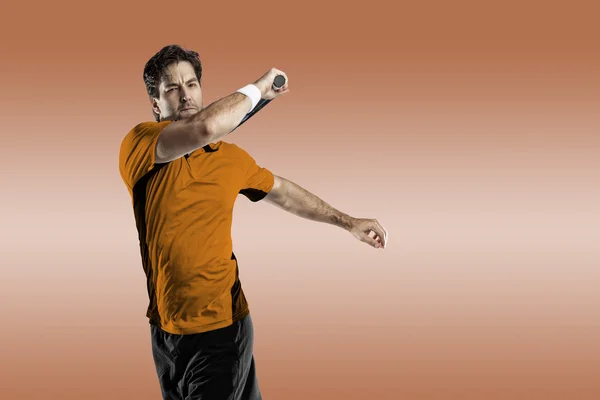 Giocatore di tennis con camicia arancione . — Foto Stock