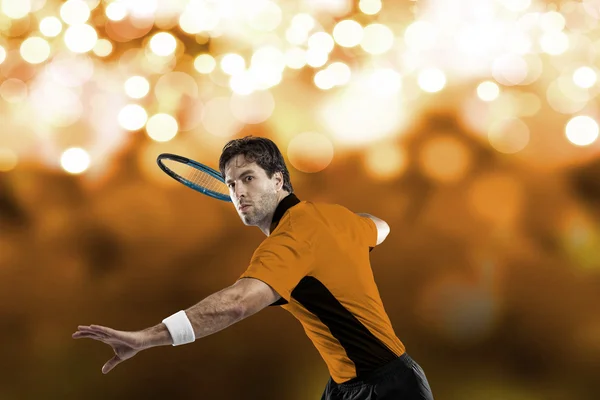 オレンジ色のシャツ、テニス選手. — ストック写真