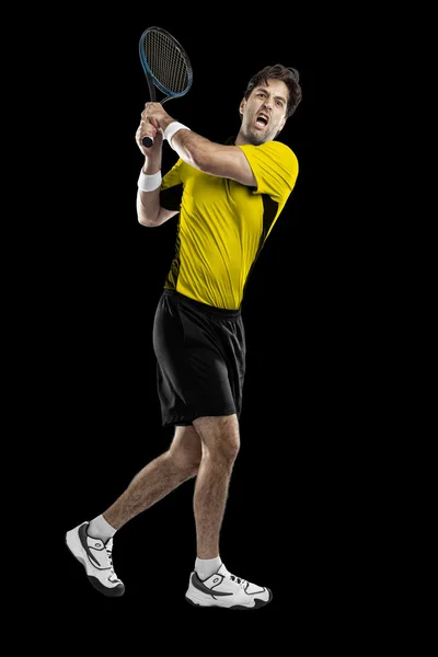 Tennisspelare med en gul skjorta. — Stockfoto