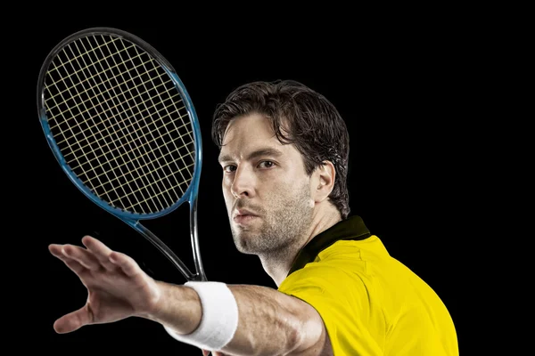 Tennis player with a yellow shirt. — Stock Photo, Image