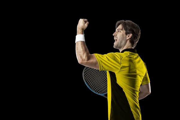 Tennis player with a yellow shirt. — Stock Photo, Image