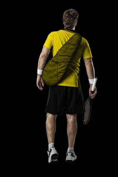 Jogador de tênis com camisa amarela . — Fotografia de Stock
